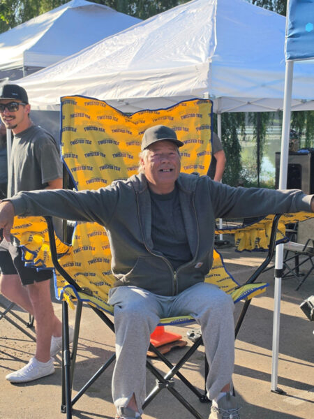 Man Laughing In Chair