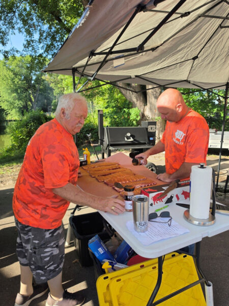 Men Prepping Ribs Table